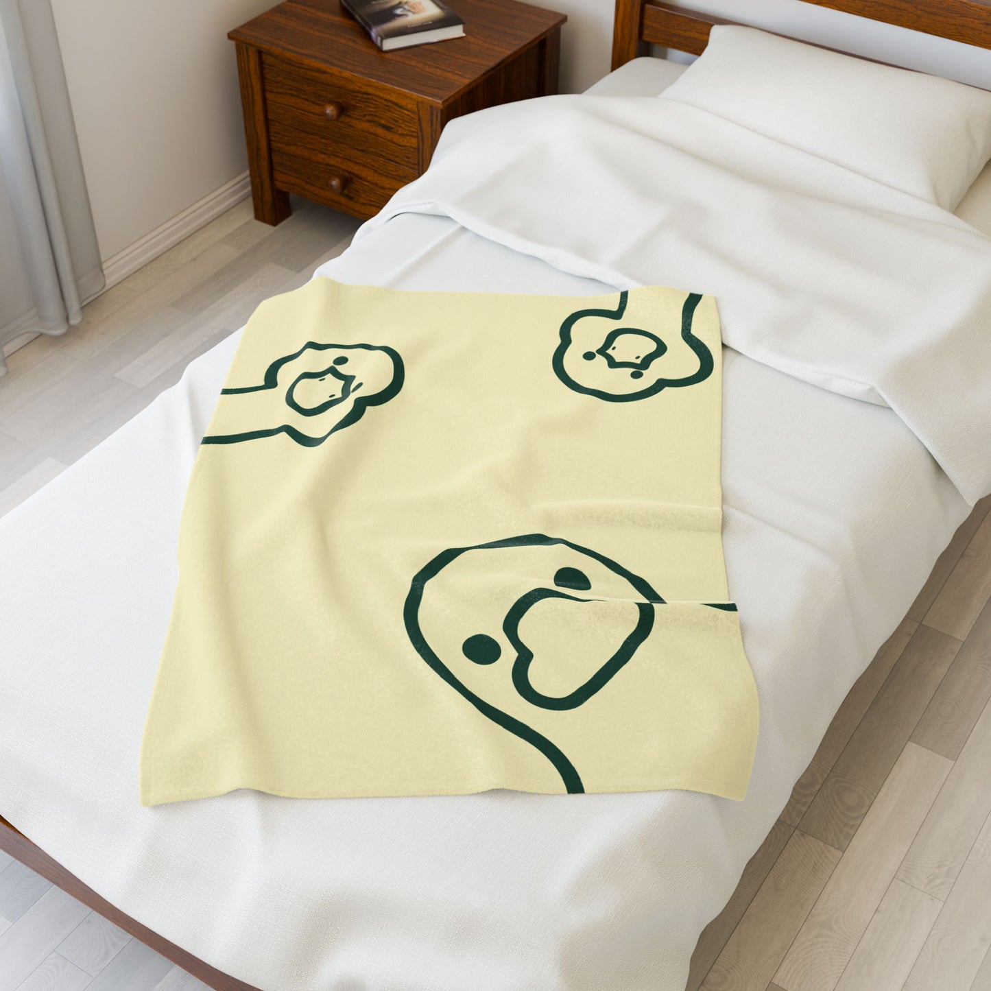 Butter yellow plush blanket styled for gifting with campus-inspired
