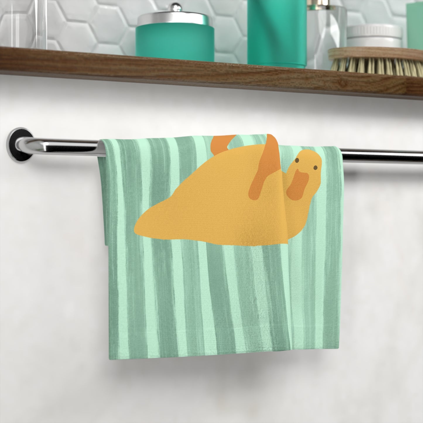 Soft and absorbent towel with quirky duck print, perfect for student self-care routines