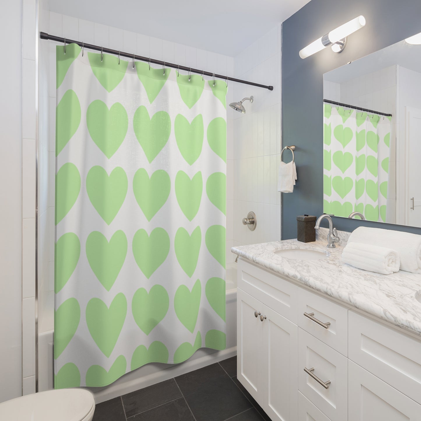 Soft pastel bathroom decor featuring oversized mint hearts, perfect for student apartments