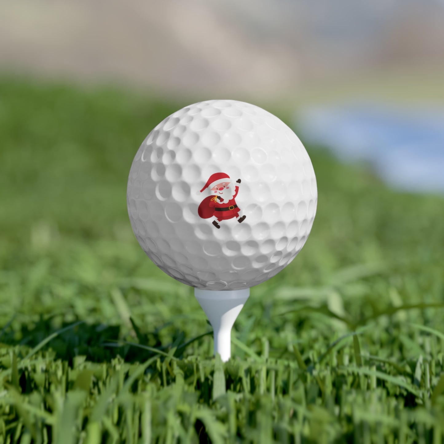 Santa-themed golf ball with holiday design for golfers and Christmas sports fans