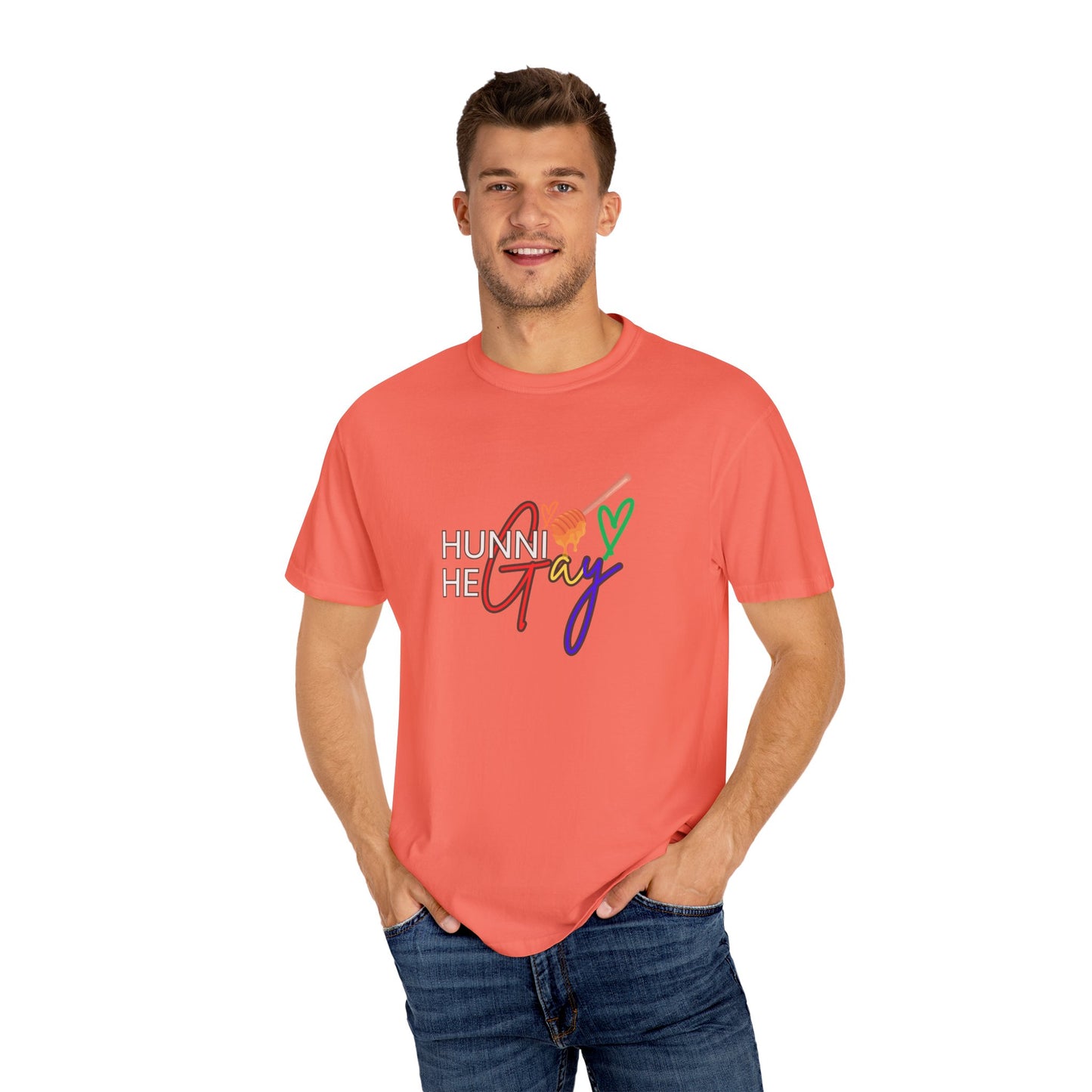 Warm peachy pink “Hunni He Gay” t-shirt with bold lettering, blending softness with vibrant LGBTQ+ pride.
