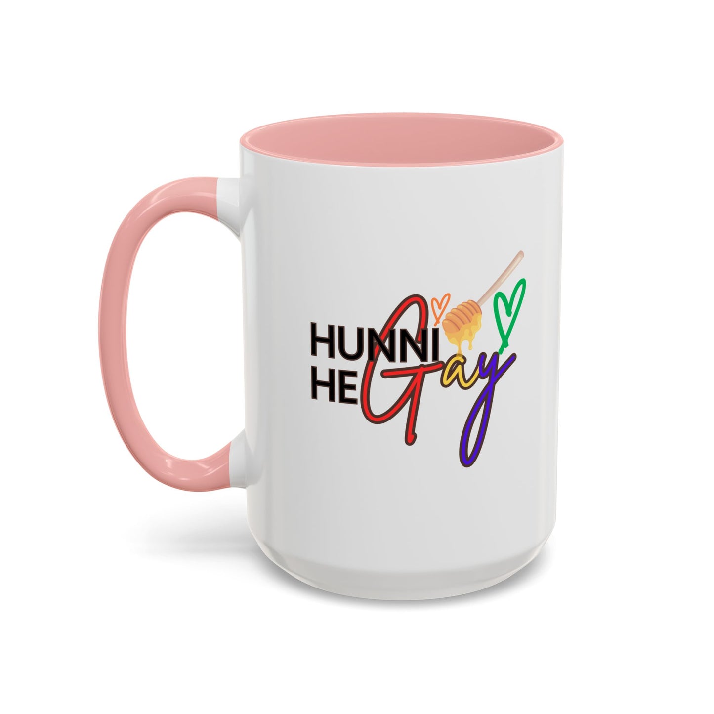 White ceramic coffee mug featuring "Hunni He Gay" in vibrant rainbow text, accented with a playful bubblegum pink handle and rim for a bold yet sweet Pride aesthetic.