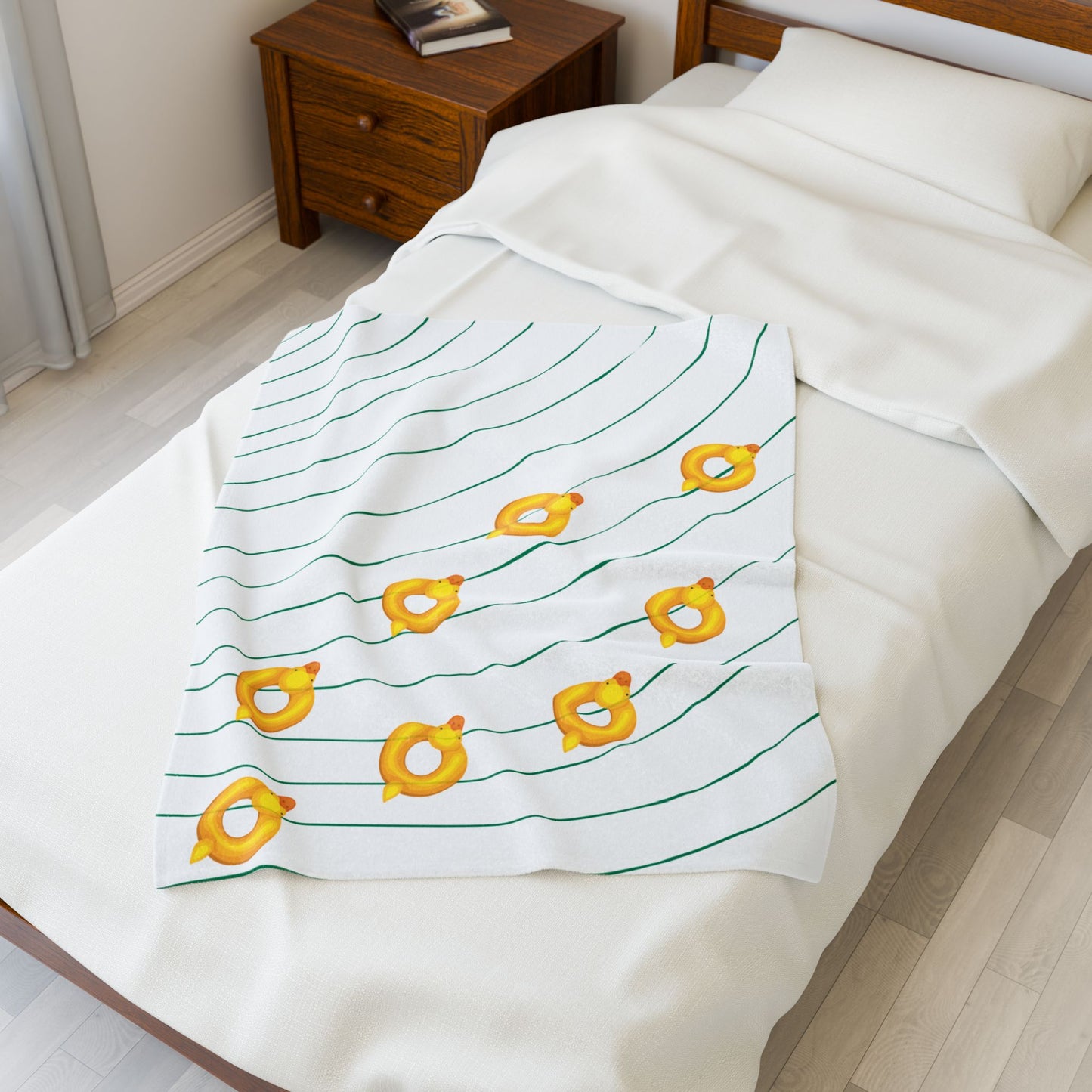 Gift-ready packaging of duck-themed college blanket for students and alumni