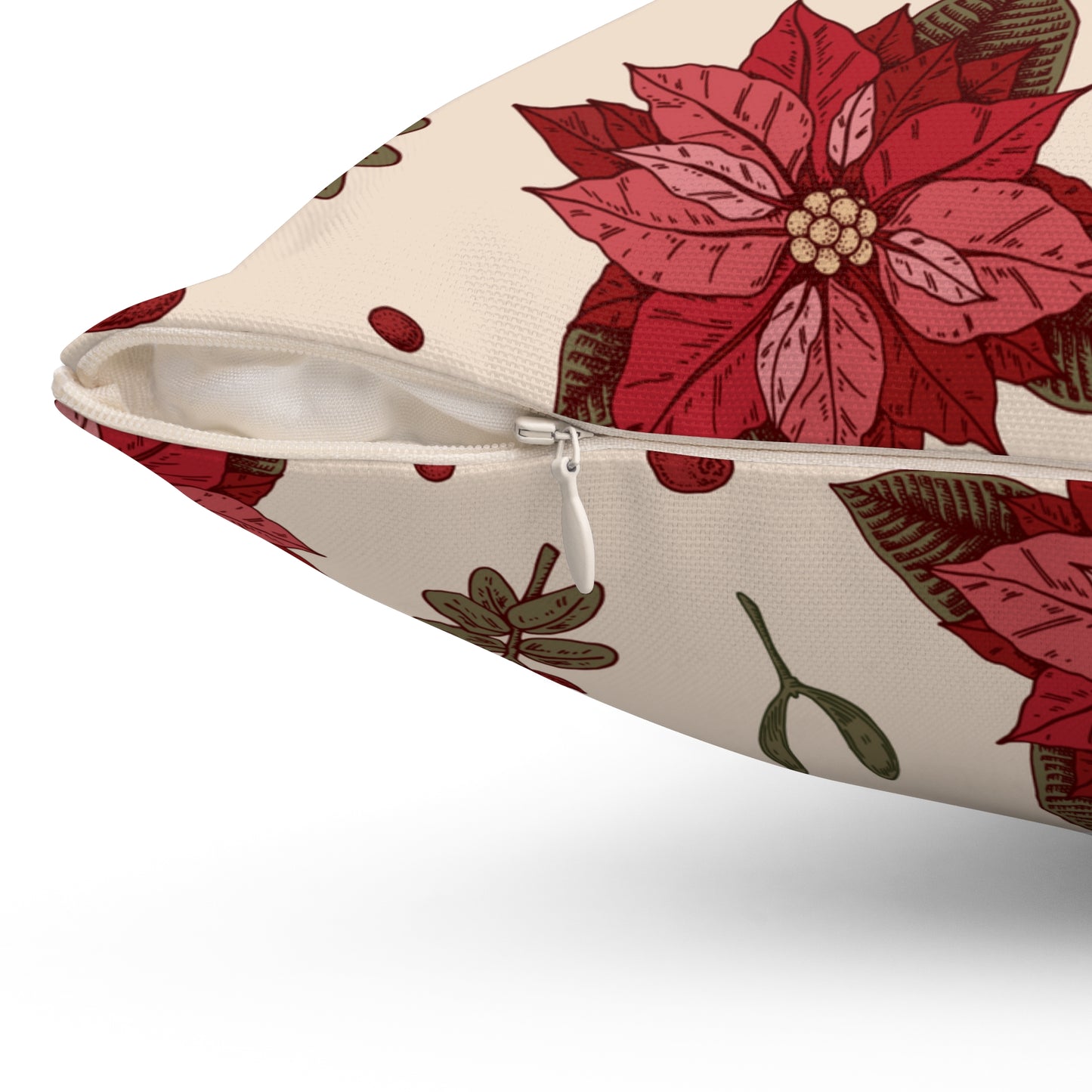 Close-up of hidden zipper on red floral Christmas pillow showing textured stitching and smooth finish