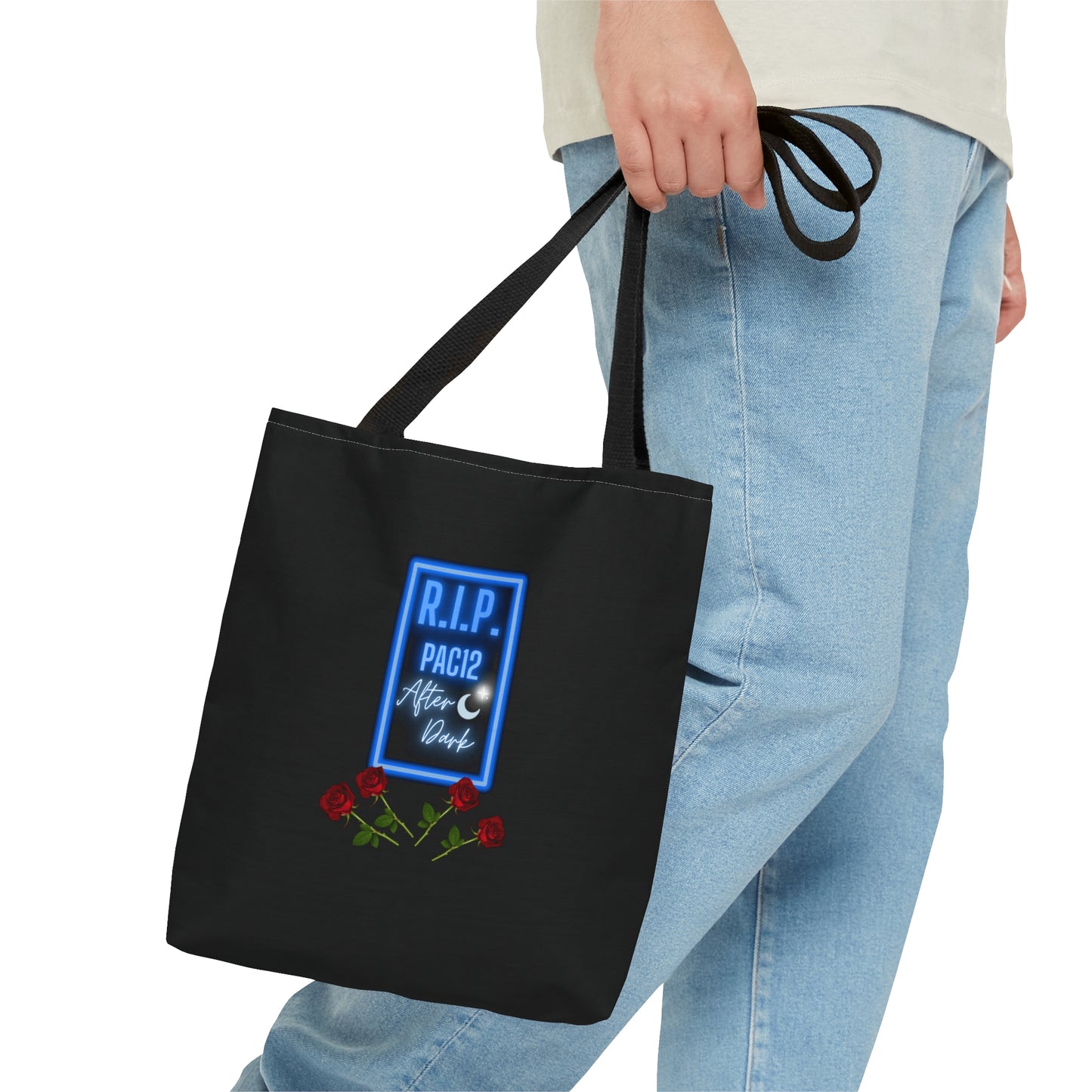 RIP Pac-12 After Dark Black Tote Bag carried at a football stadium, celebrating the legendary late-night games of the Conference of Champions.