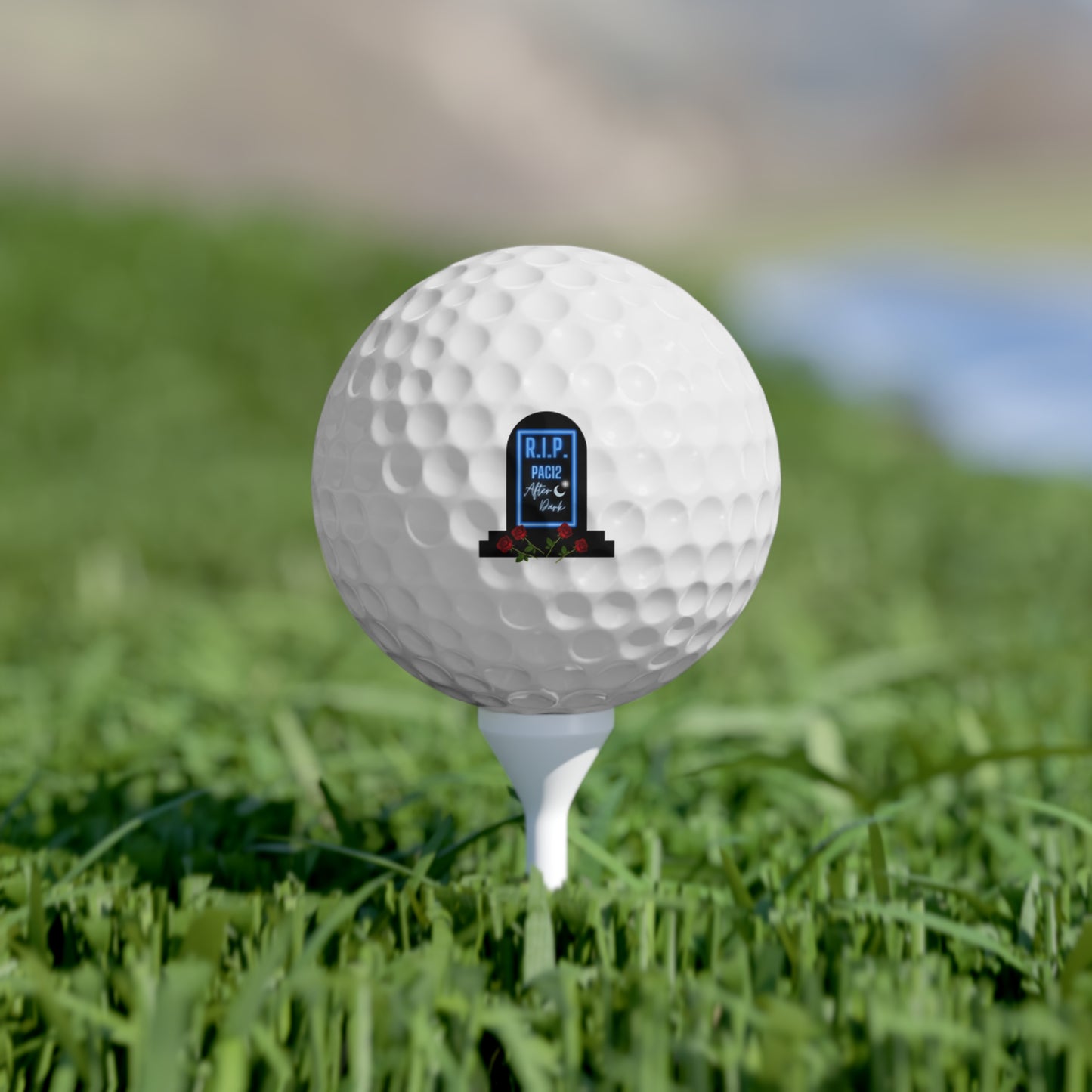 RIP Pac-12 Golf Ball on tee, celebrating the legendary conference through every drive.