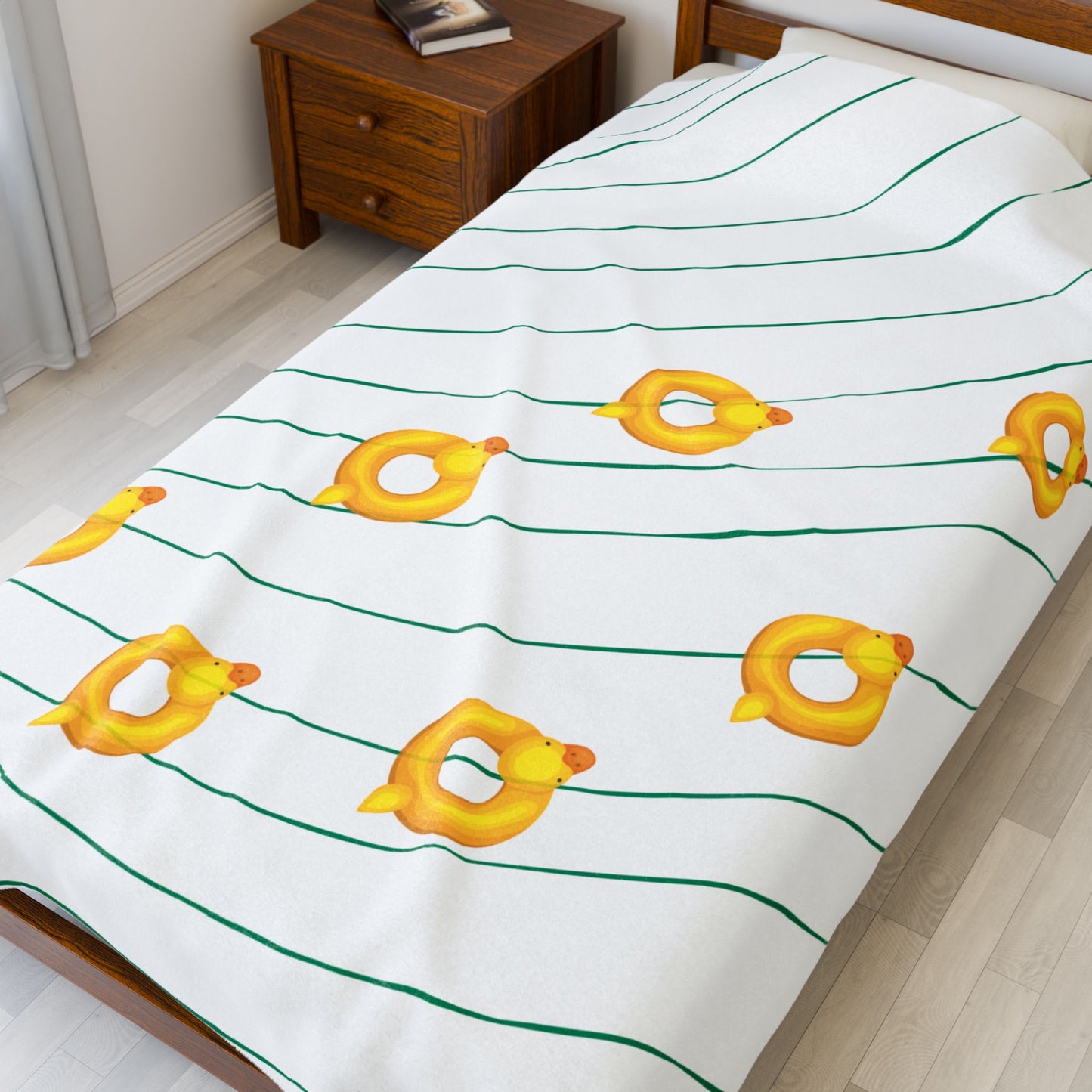 Close-up of plush texture and playful duckie pattern for quirky bedding