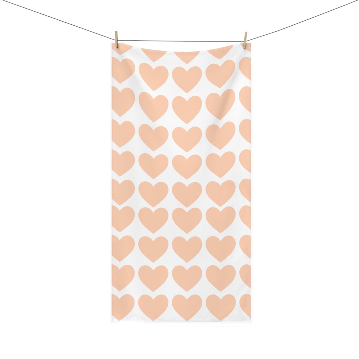 Soft orange hearts bath towel styled in a cozy Corvallis bathroom with college-inspired decor