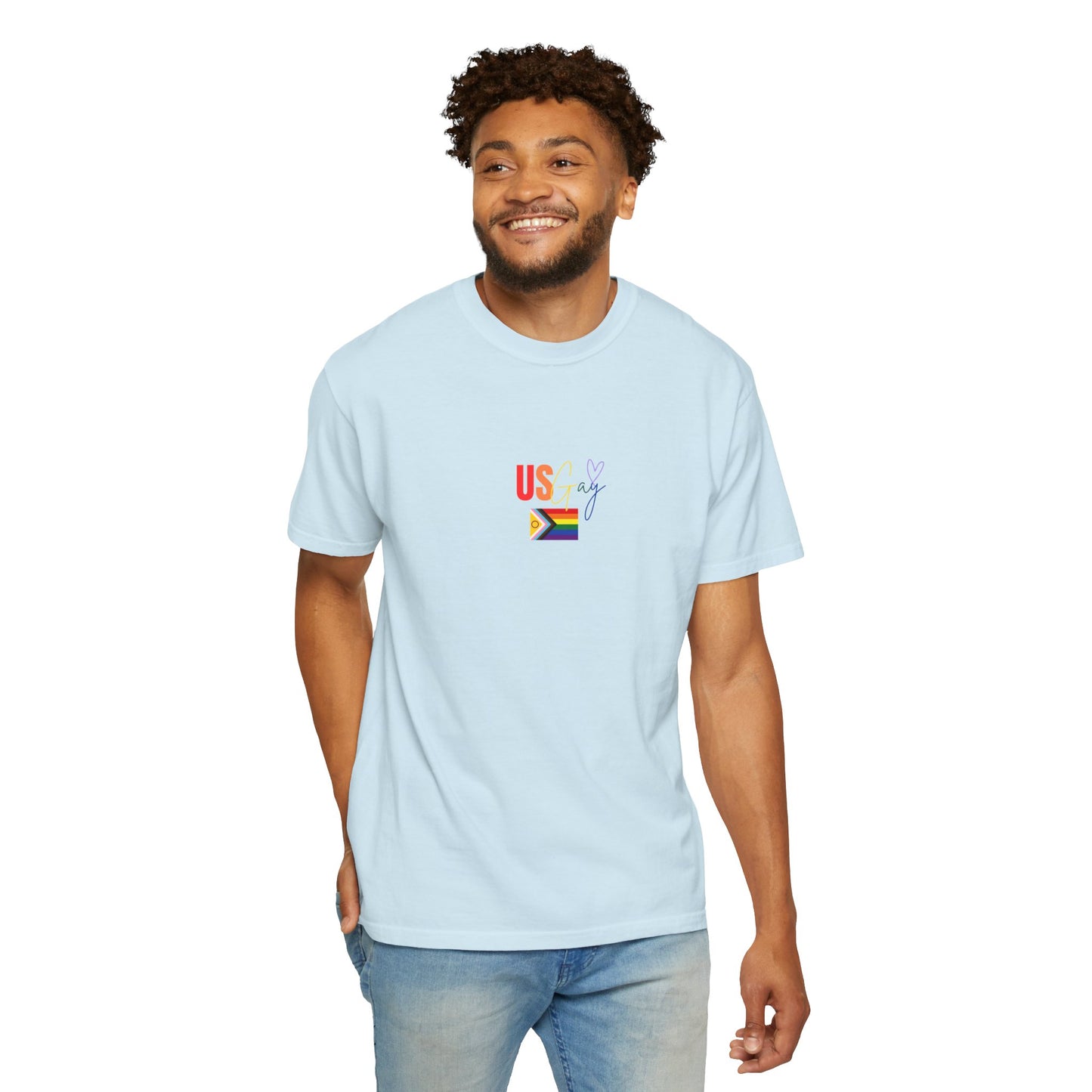Soft baby blue t-shirt featuring "US Gay" in bold rainbow text alongside a classic Pride flag, blending cool tones with a vibrant LGBTQ+ statement.