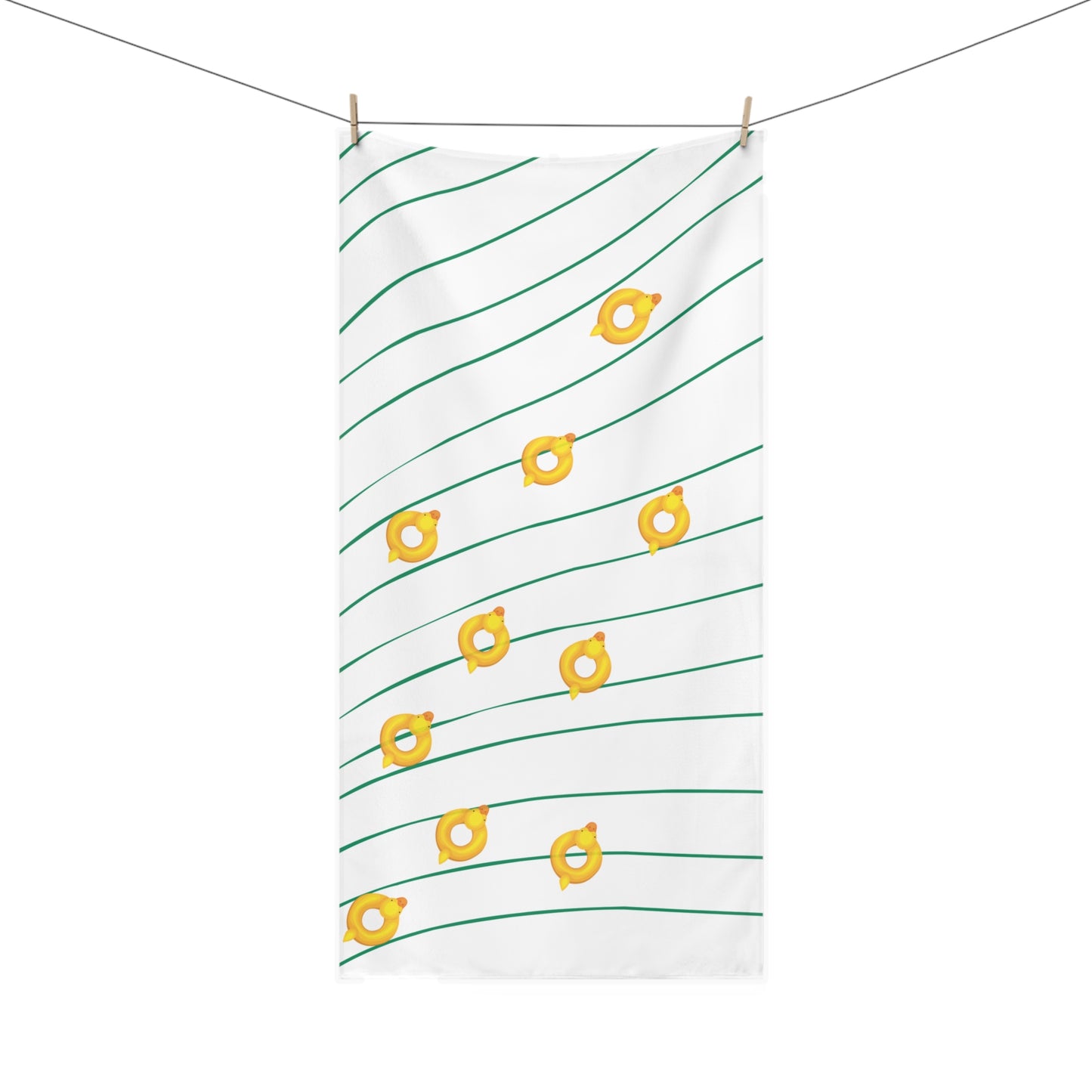 Beach towel with rubber ducky design over wavy green and gold pattern – playful and retro summer accessory