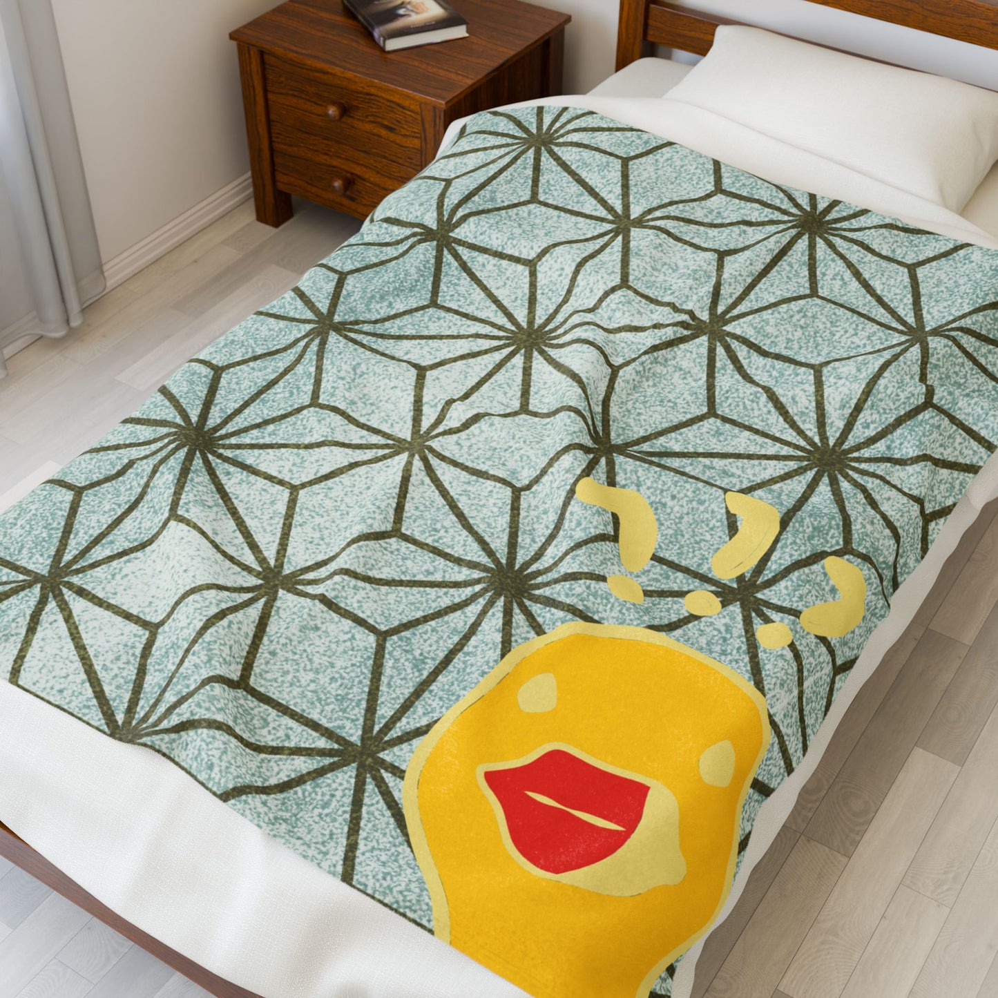 Bold statement blanket featuring snarky duck phrase in green and gold angular design