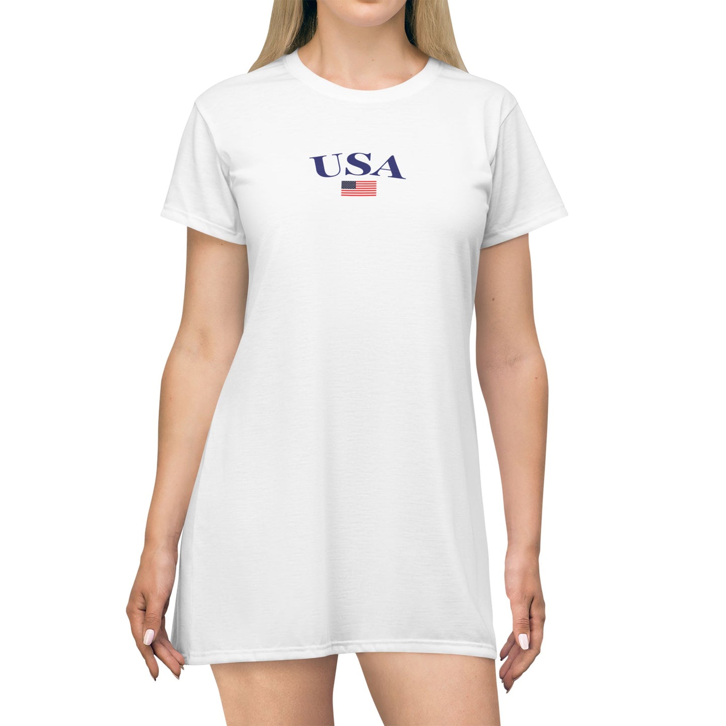 Classic white t-shirt dress featuring a bold USA graphic with an American flag, designed for effortless Fourth of July patriotism and summer comfort.