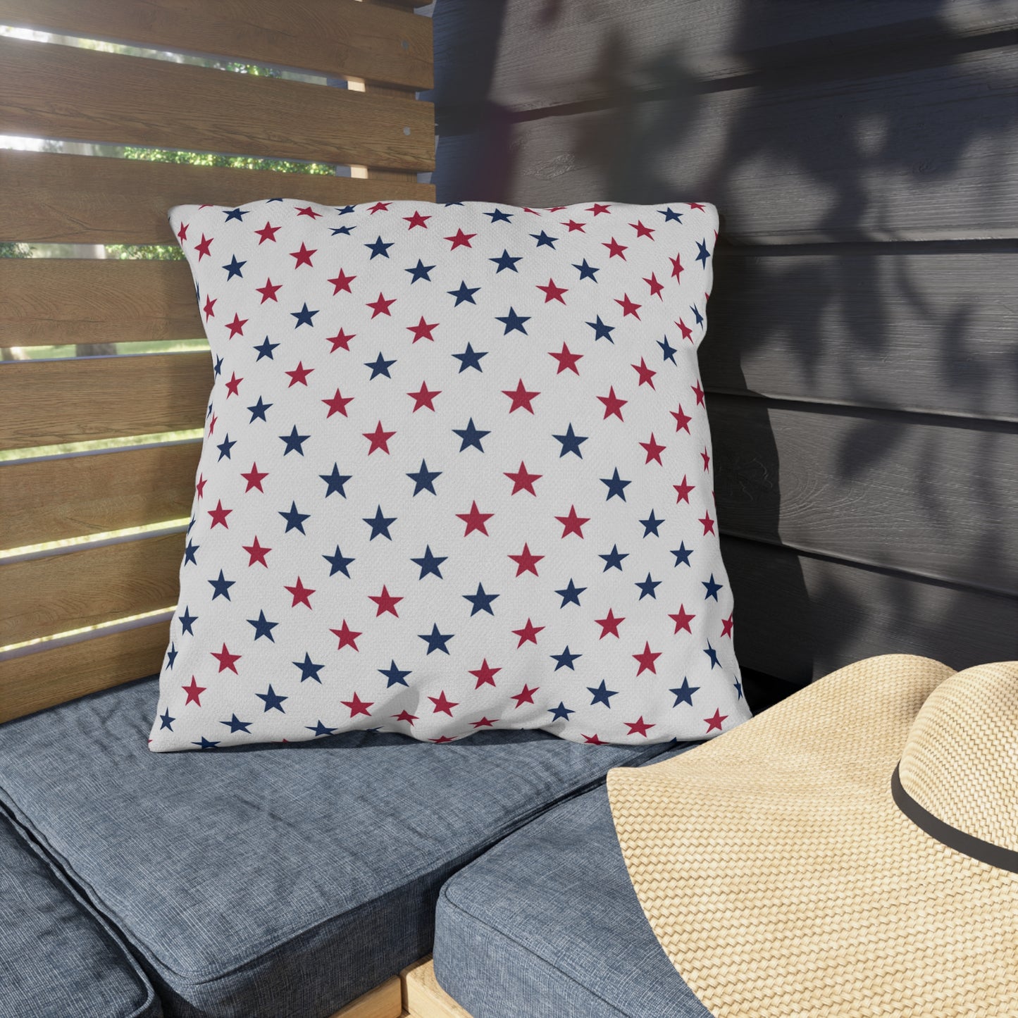 Classic Americana throw pillow showcasing vibrant red, white, and blue star patterns—ideal for celebrating the Fourth of July.