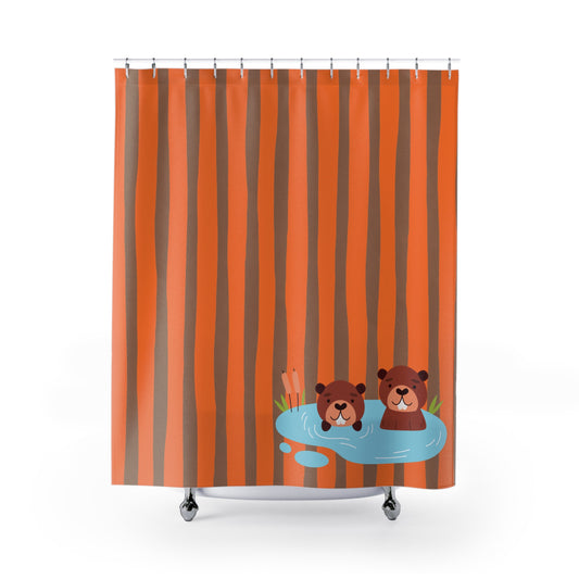 Front view of orange and black striped Beaver Dive shower curtain hanging in a modern bathroom
