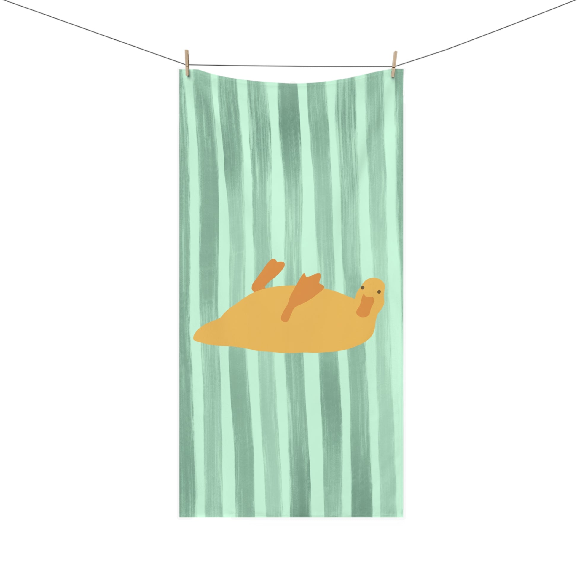 Bathroom towel featuring bed rot duck resting on green stripes – cozy and quirky decor for dorms and mood-forward homes
