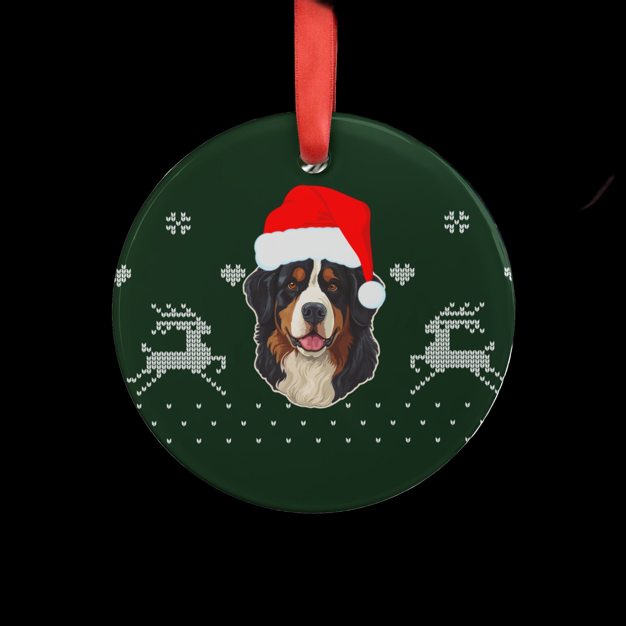 bernese mountain dog ornament wearing Santa hat hanging on a Christmas tree with twinkle lights and green pine branches