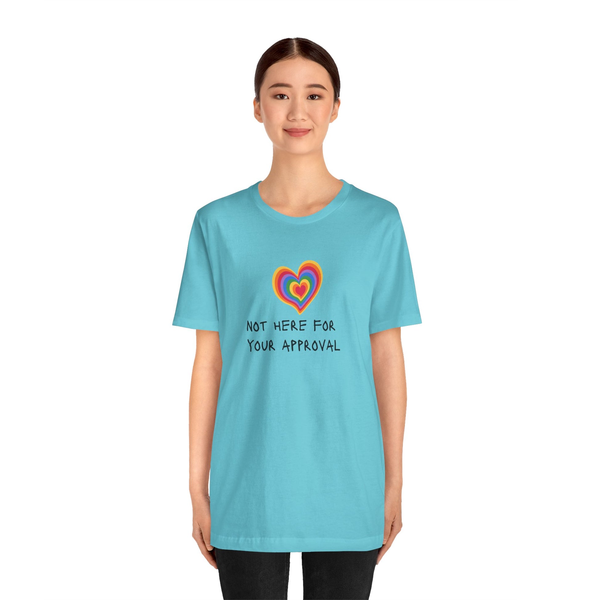 Striking teal Pride T-shirt showcasing colorful “Not Here for Your Approval” lettering and a rainbow heart—playful, unapologetic, and perfect for Pride celebrations.