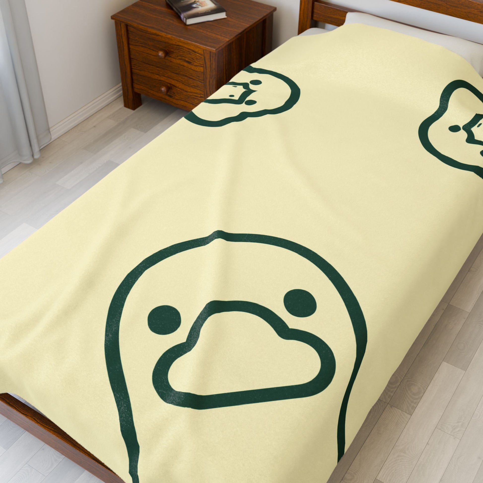 Close-up of soft plush texture on butter yellow college blanket for dorm and apartment decor