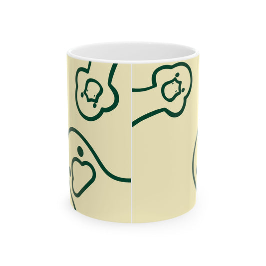 Butter yellow coffee mug featuring duck illustration and ‘What You Duckin’ Looking At?’ phrase for quirky college kitchen style