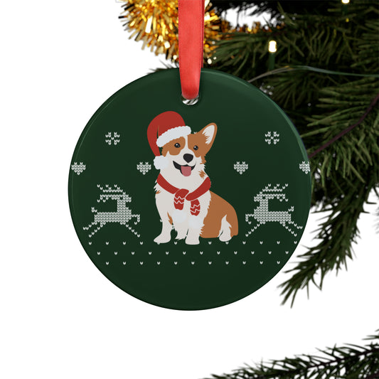 corgi ornament wearing Santa hat hanging on Christmas tree with holiday lights and red ribbon