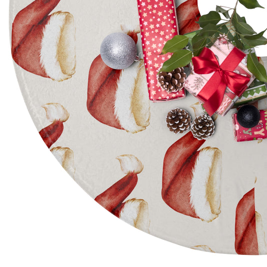 Santa hat–inspired red Christmas tree skirt with white trim styled under a decorated tree in a cozy holiday living room with stockings and gift