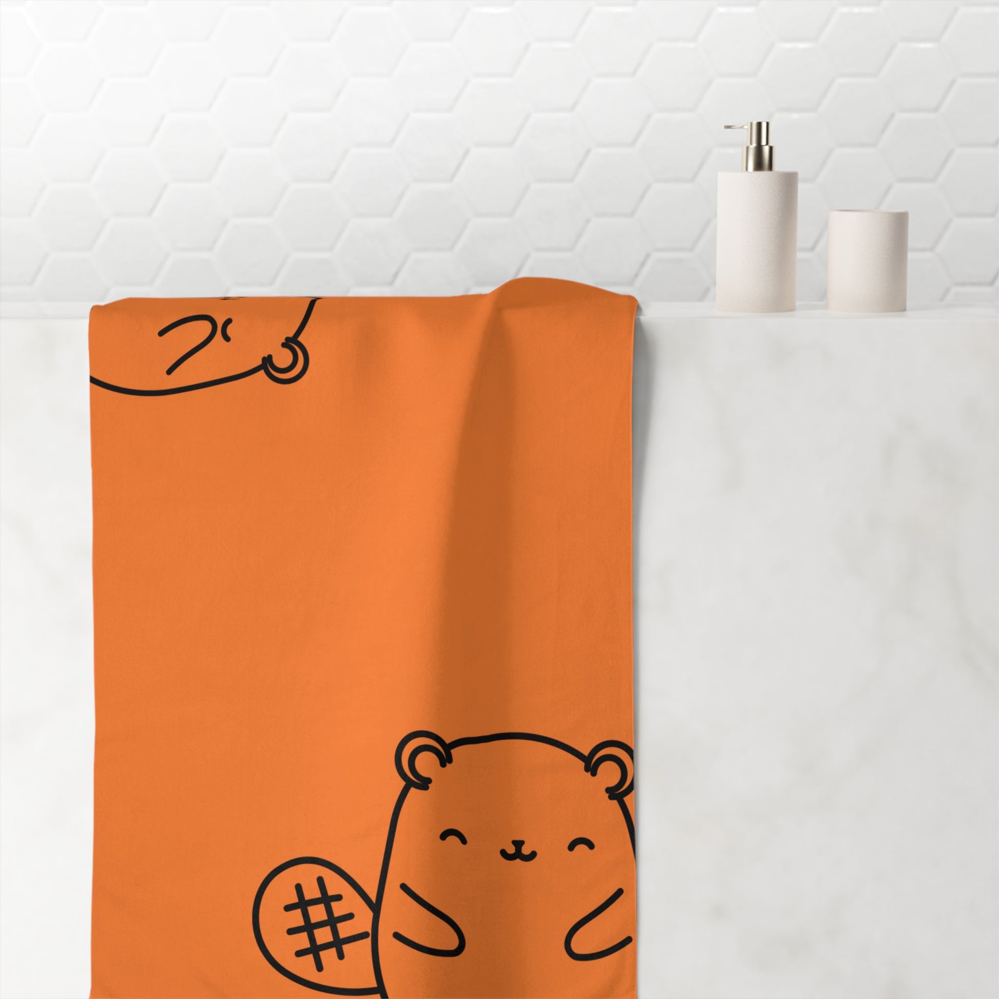Close-up of QT beaver-inspired detail on orange towel