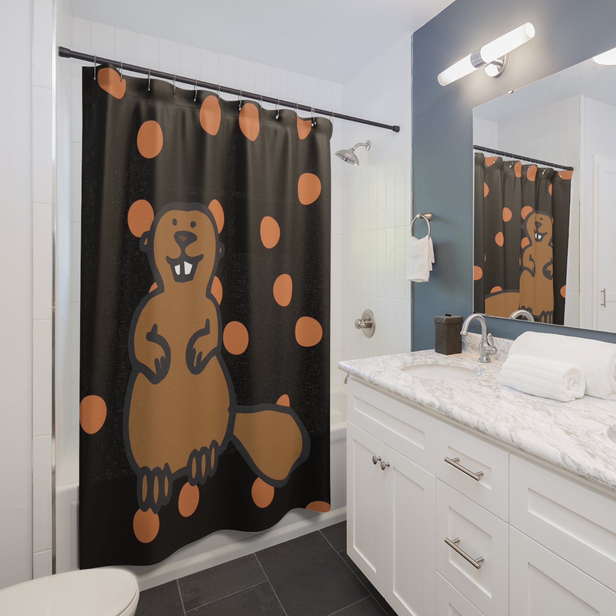 Styled bathroom scene with polka dot beaver shower curtain, orange accents, and college-themed decor