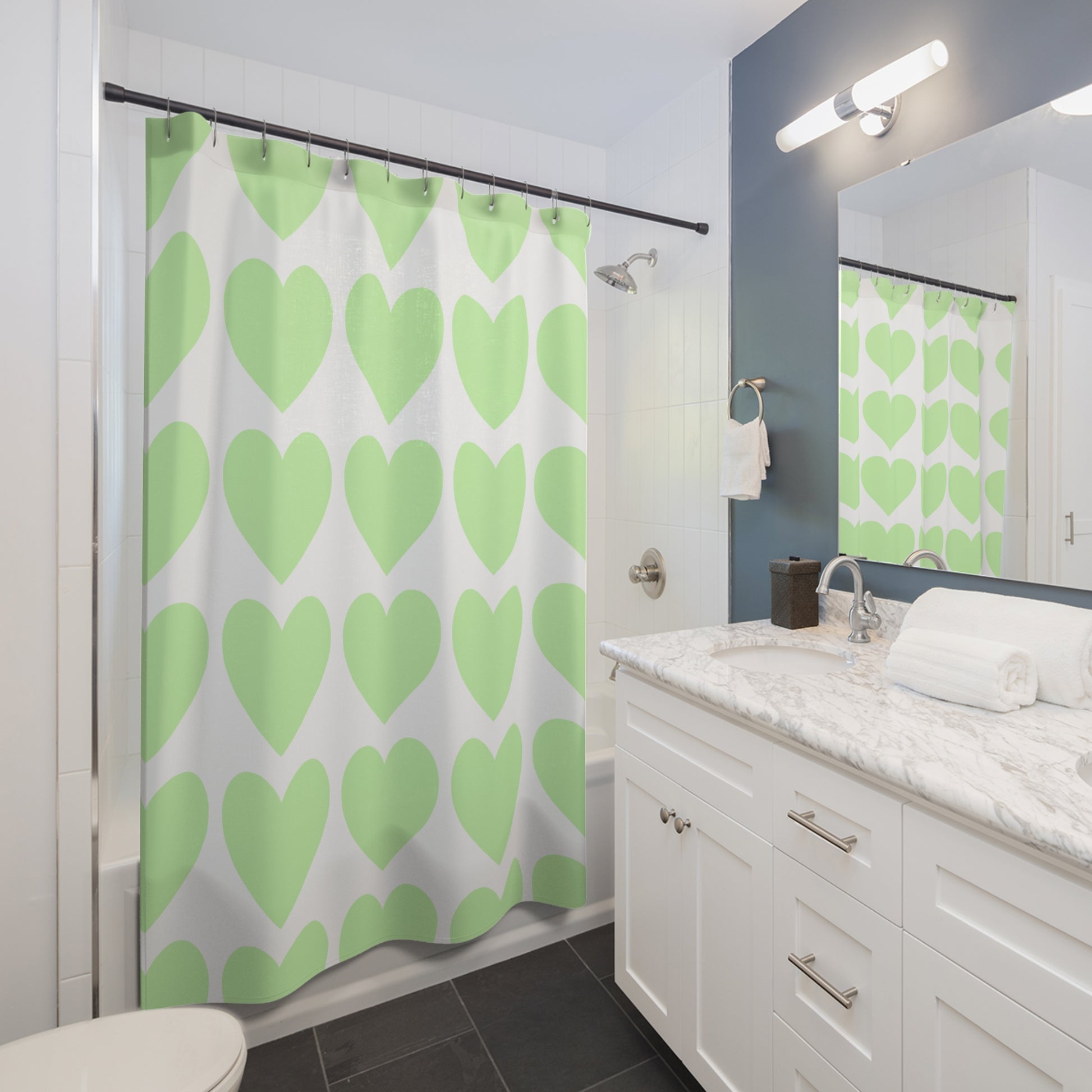 Soft pastel bathroom decor featuring oversized mint hearts, perfect for student apartments