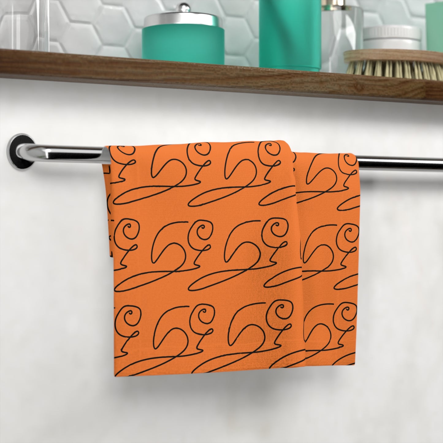 Face towel styled in cozy bathroom with warm lighting and minimalist decor