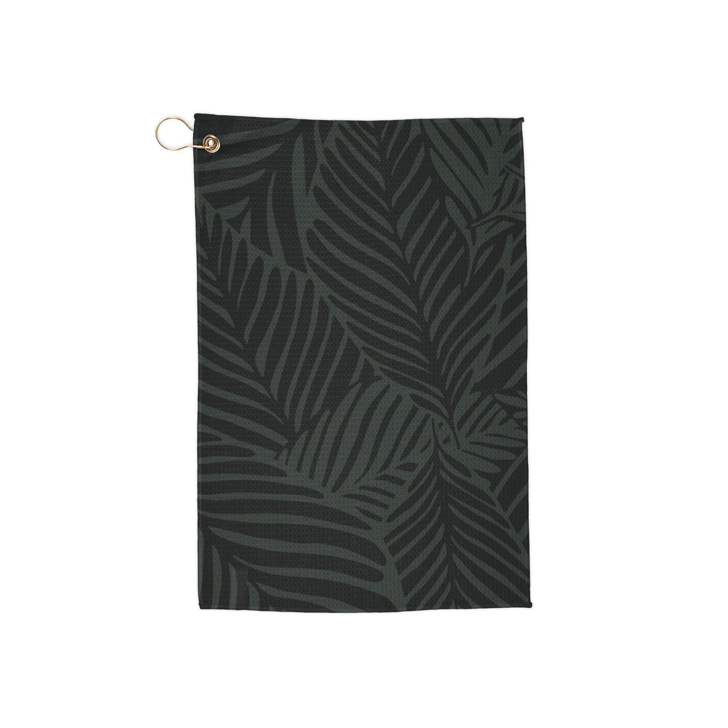 A moody, rich-toned golf towel covered in deep green jungle leaves for an earthy, tropical aesthetic. Stylish and effortlessly cool.