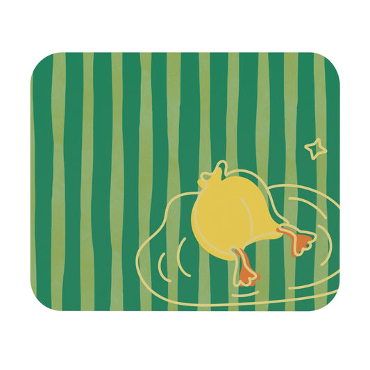 Duck-themed mouse pad with bold green and yellow horizontal stripes, styled on a college desk setup with notebooks and pens