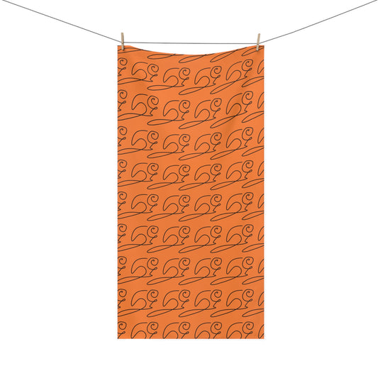 Front view of elegant cursive beaver-inspired orange bath towel