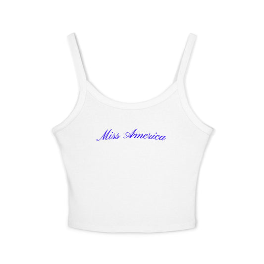 Trendy white tank top showcasing blue cursive “Miss America” text—cute, comfortable, and ideal for summer celebrations.