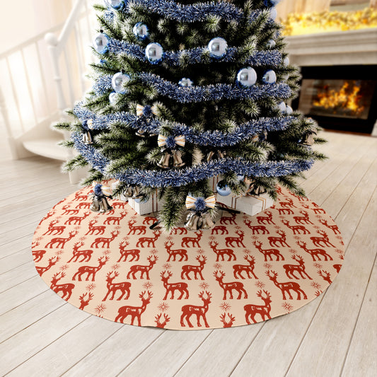 Red Christmas tree skirt with white reindeer design styled under a decorated tree in a cozy holiday living room with fireplace and stockings