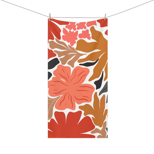 Front view of maximalist floral orange and black bath towel