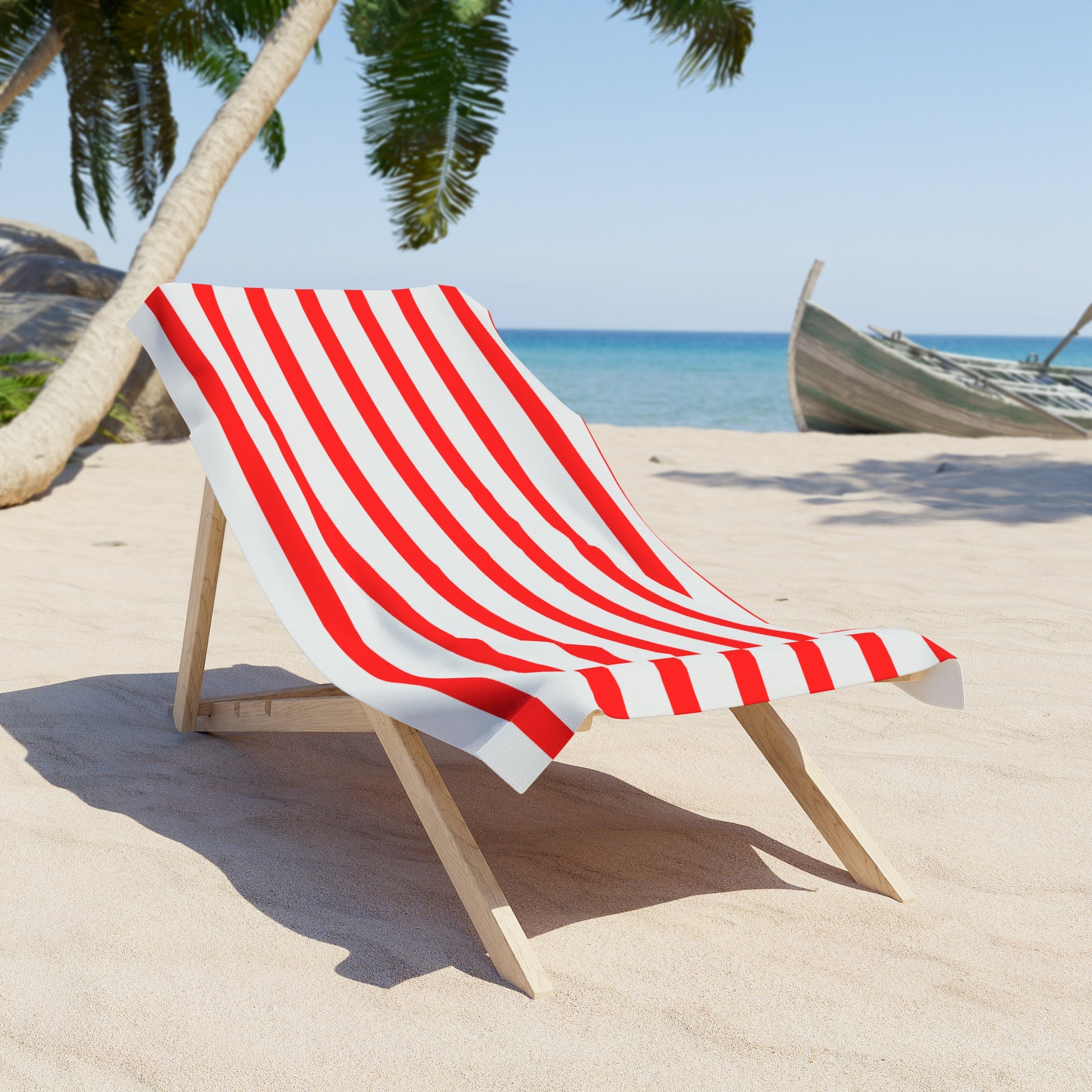 Vibrant red-and-white striped beach towel inspired by classic Fourth of July decor, perfect for patriotic summer celebrations by the water.