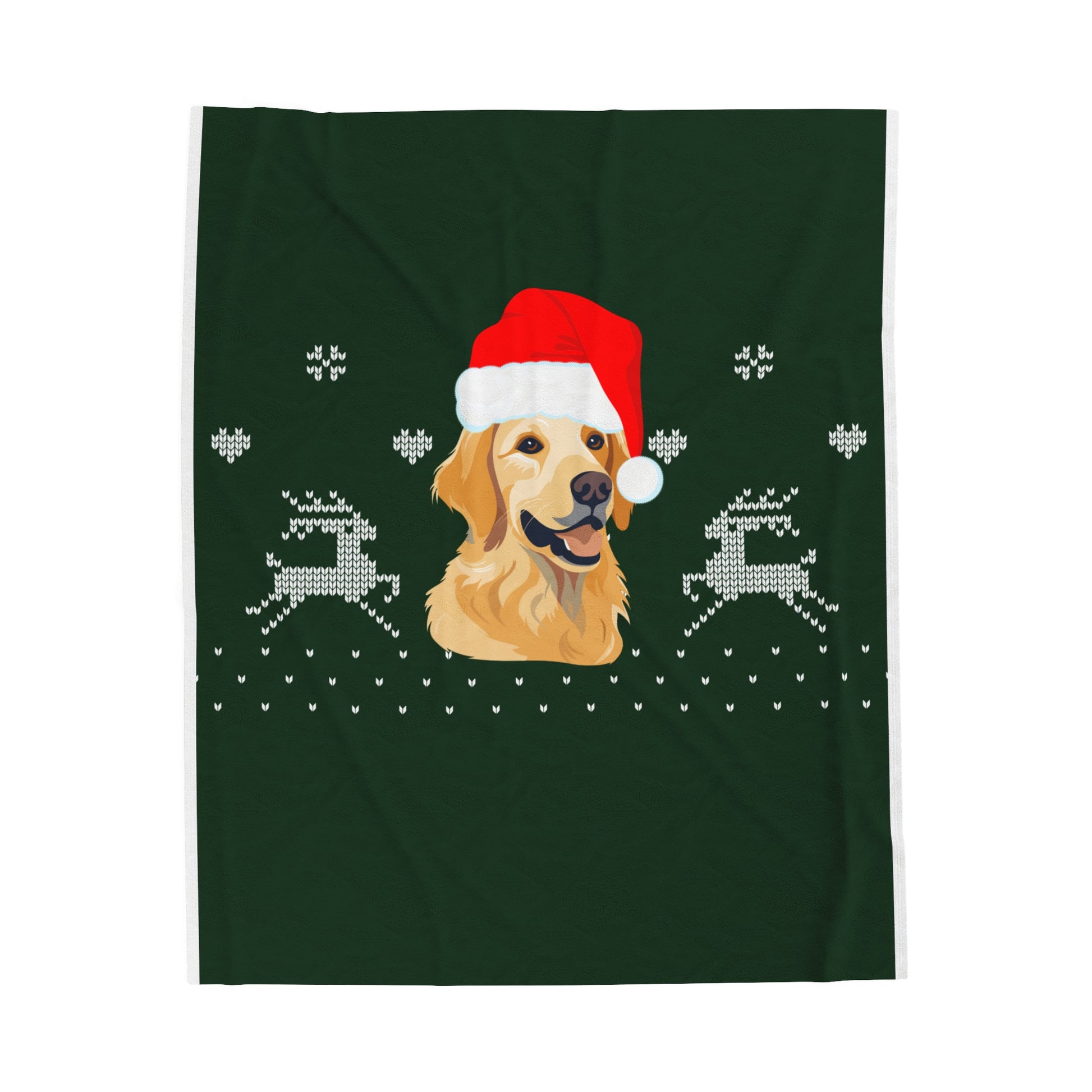 Flat lay of green Christmas blanket with golden retriever Santa design folded on soft surface with holiday props