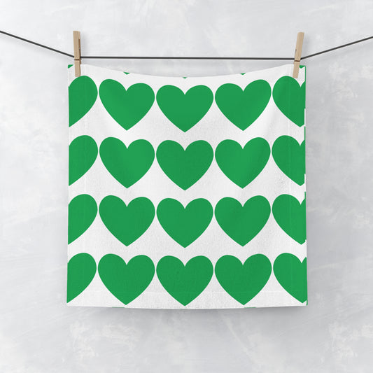 Green face towel with soft heart accents for college dorm bathroom decor