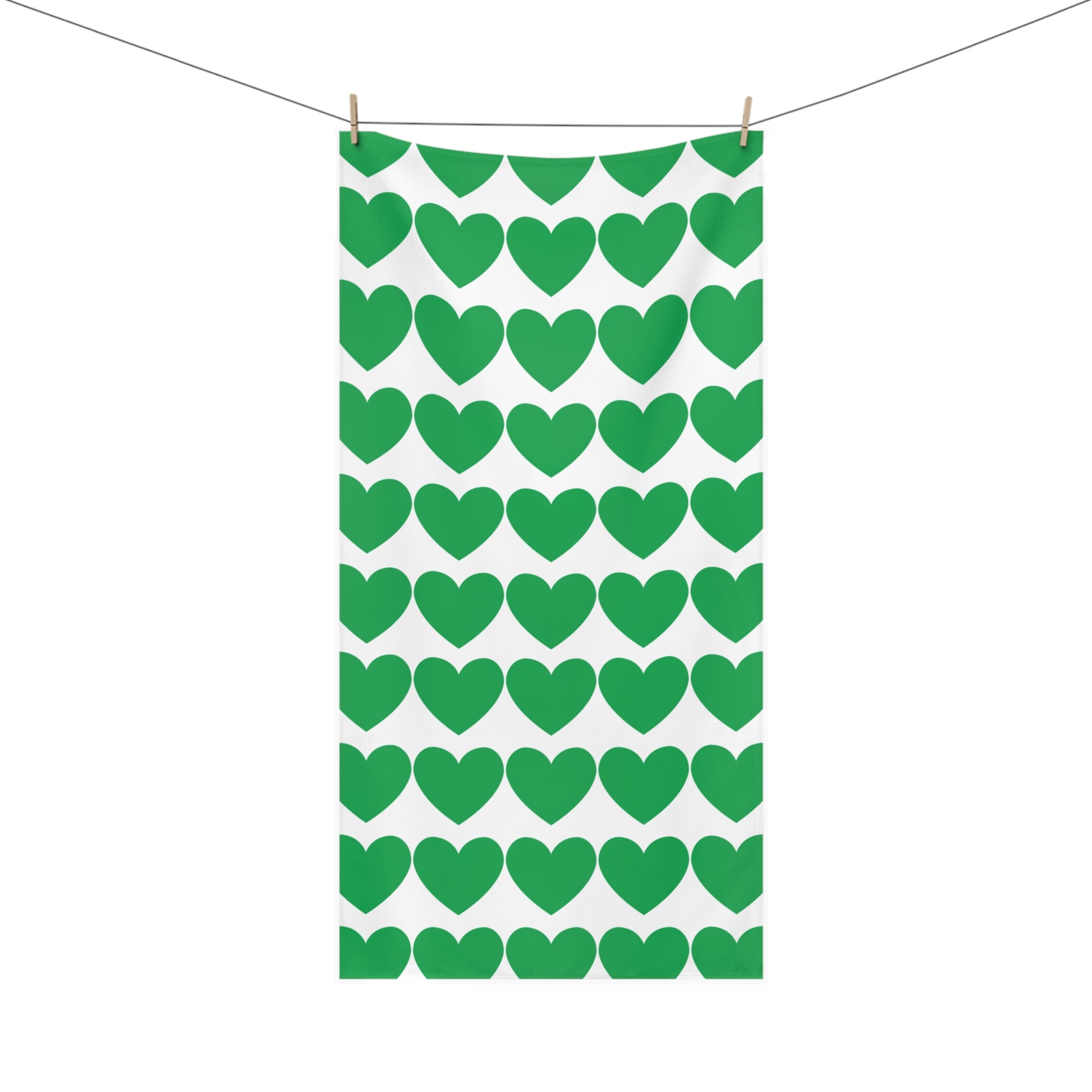 Bathroom towel featuring scattered green hearts – soft and whimsical decor for cozy home and dorm spaces