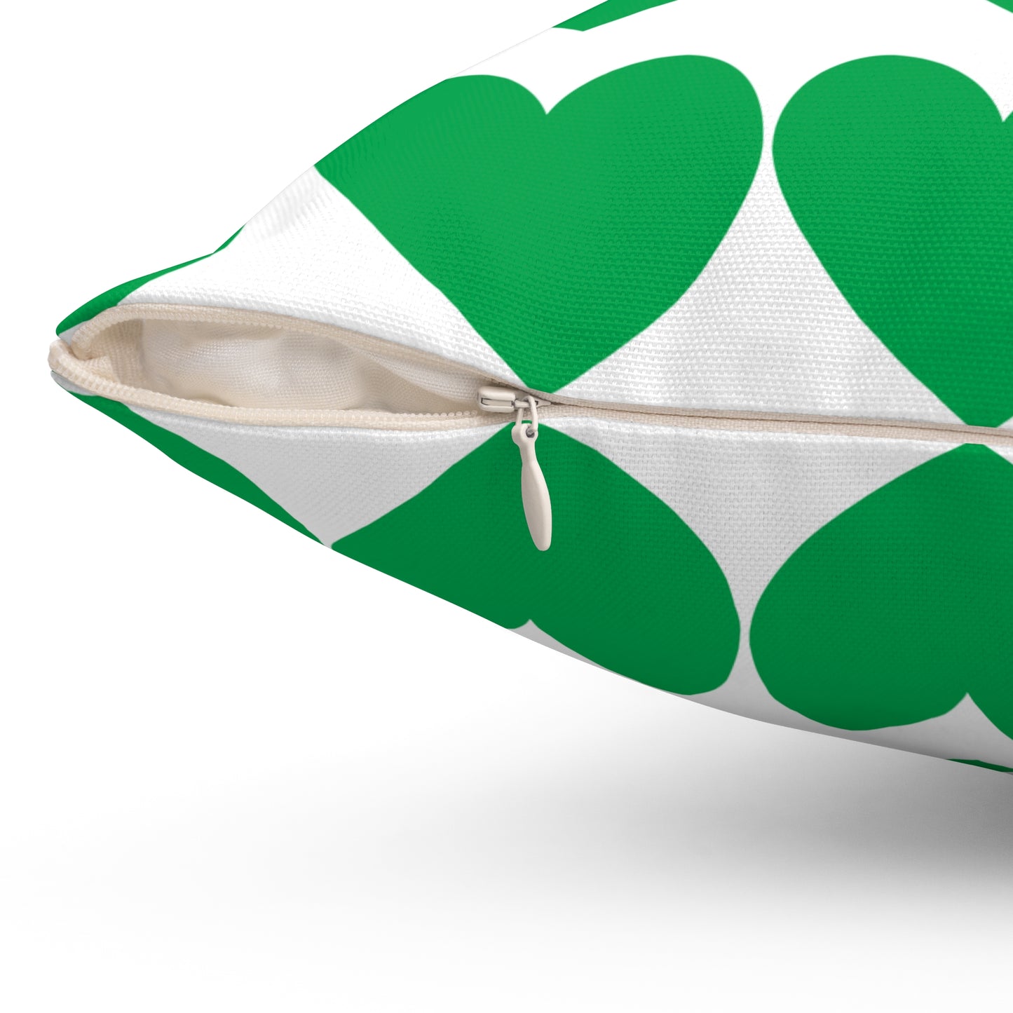 Cute green pillow adding charm to a retro-themed lounge chair
