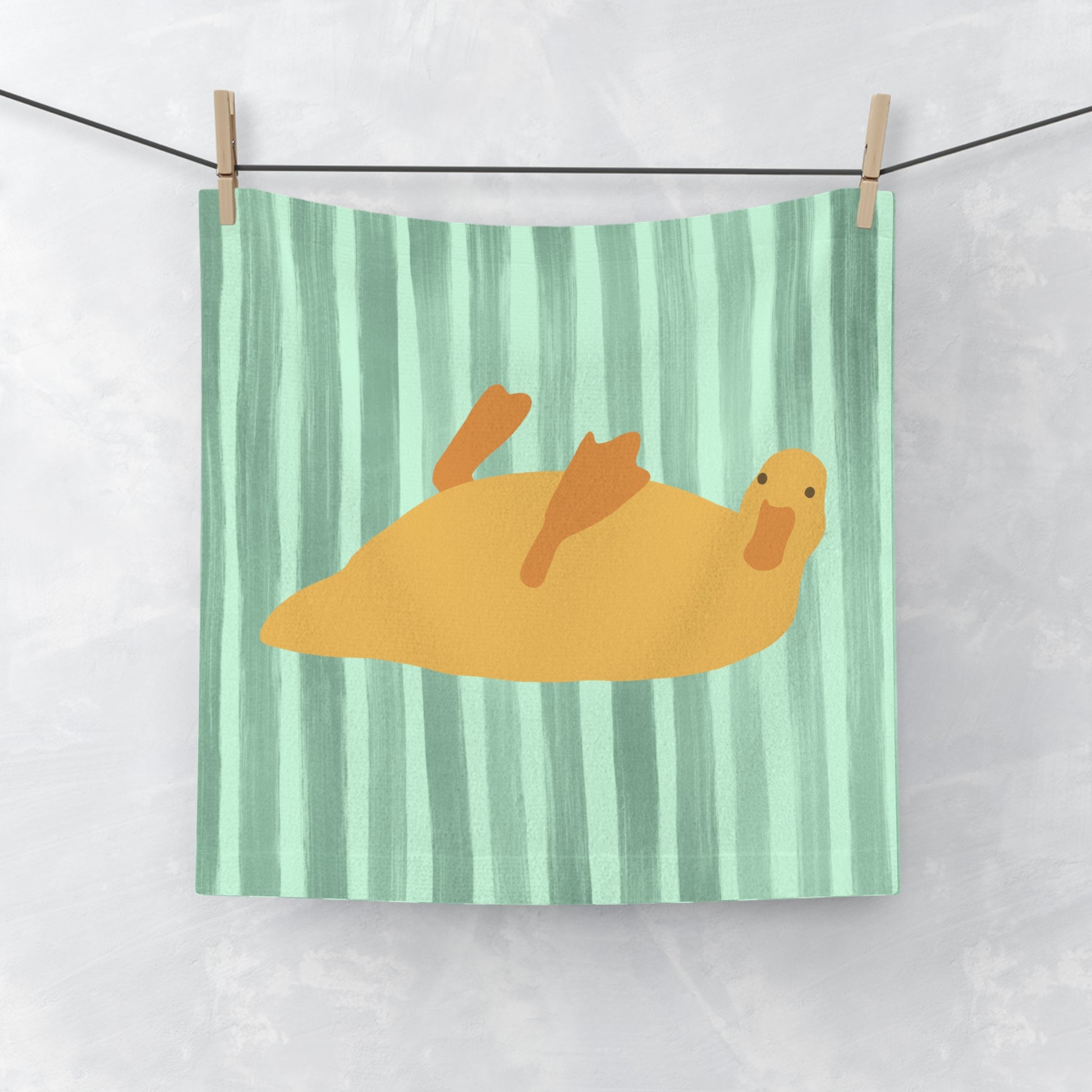 Green-striped face towel featuring bed rot duck design for cozy college dorm style