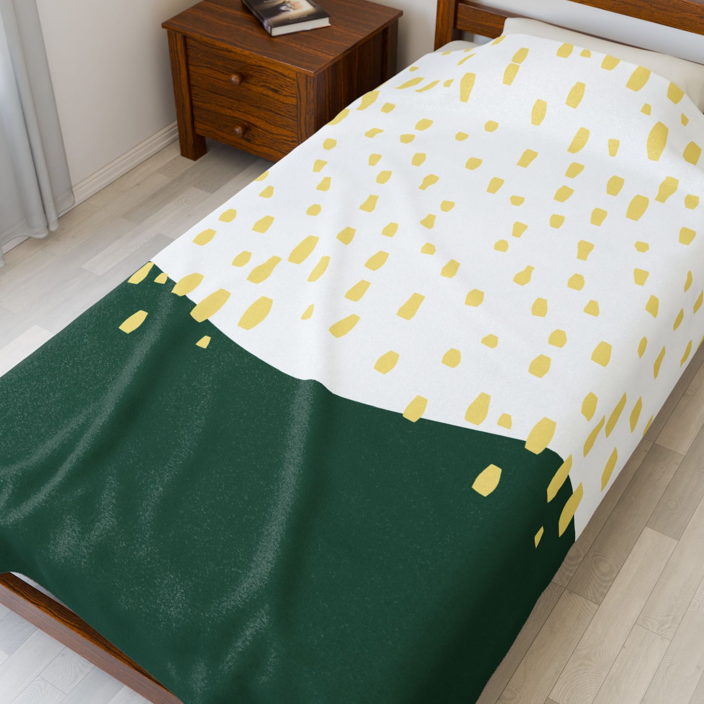 Detail view of plush texture and midcentury rain design in olive and lemon tones
