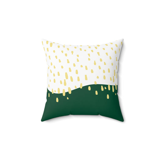 Green and yellow rain-pattern throw pillow styled with midcentury furniture in a dorm room