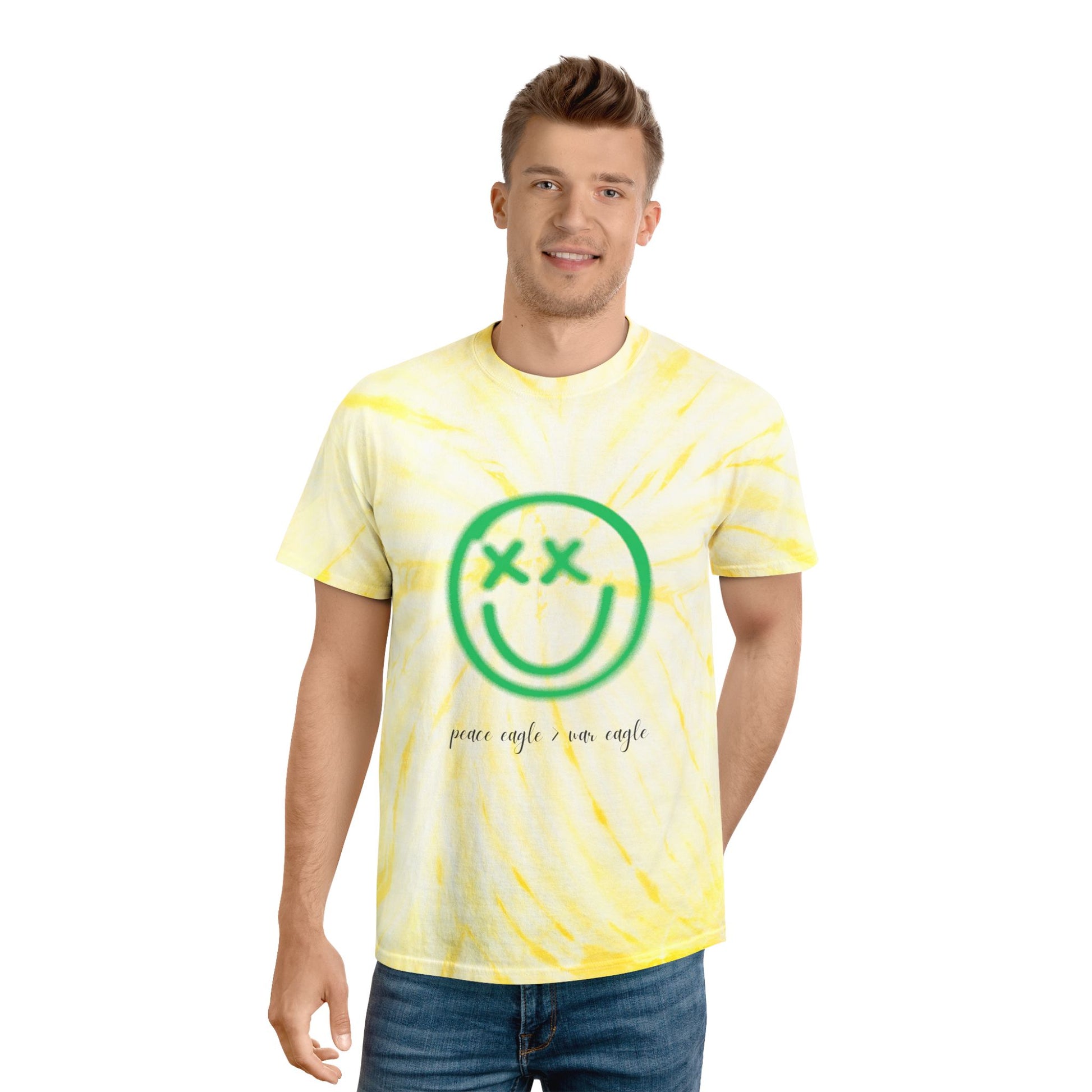 Green and yellow tie-dye shirt with smiley graphic and “peace eagle > war eagle” text, styled for expressive college football fans.