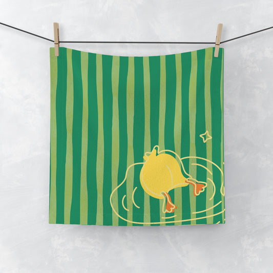 Green and yellow striped towel with duck dive design for college dorm bathroom decor