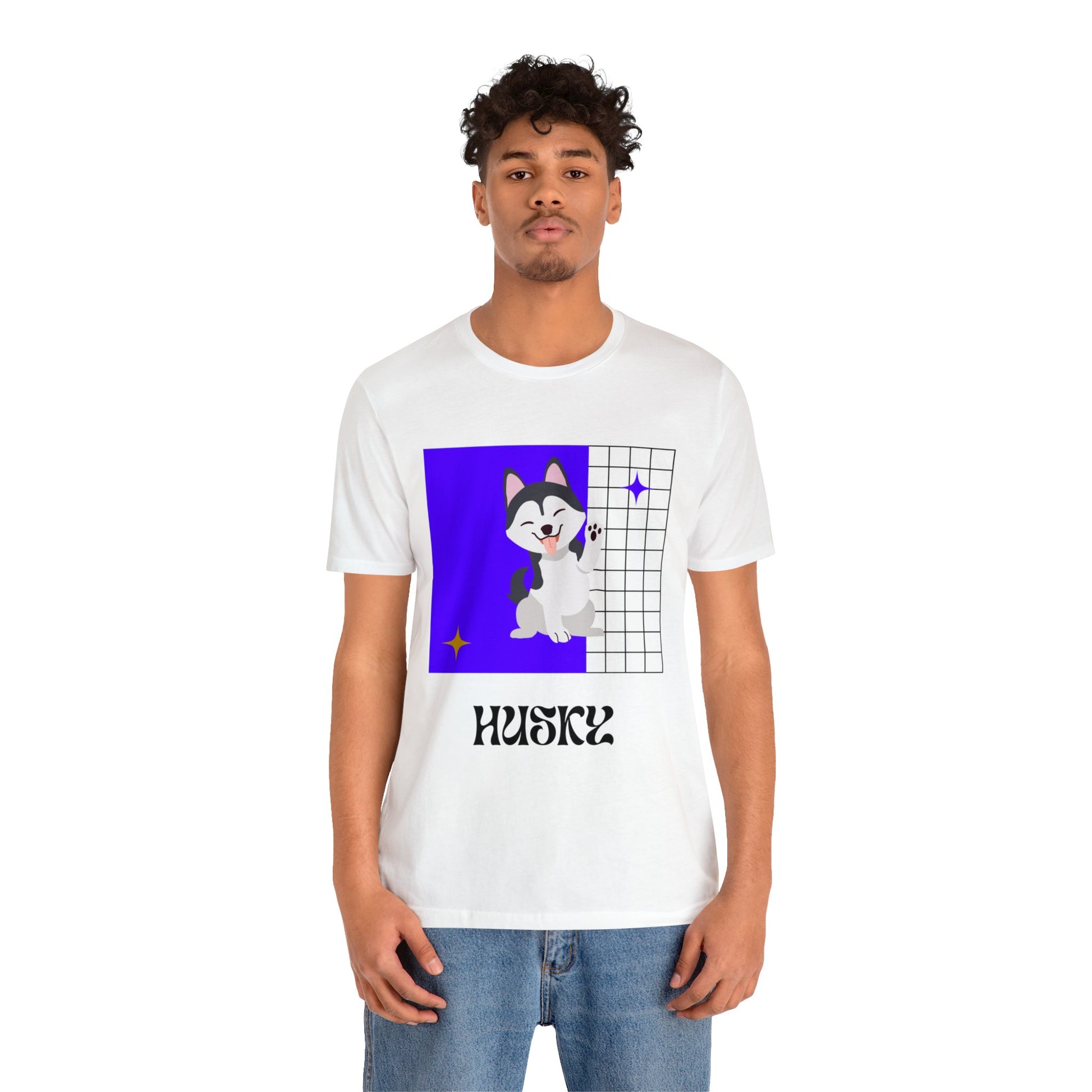 Man walking on campus in heather ice blue tee with playful husky mascot design, styled with backpack and relaxed jeans—casual college look.