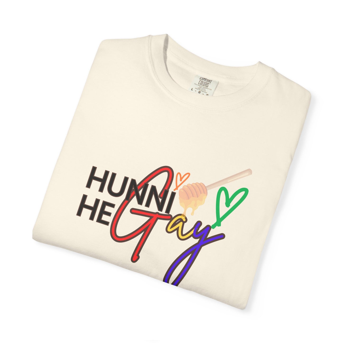 Minimalist beige "Hunni He Gay" t-shirt with colorful rainbow text, perfect for a subtle yet strong Pride expression.