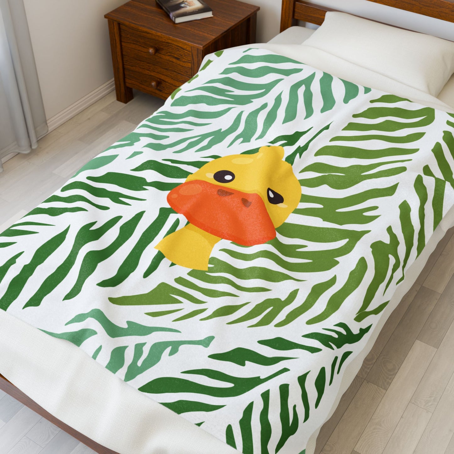 cozy plush throw featuring jungle and duck motifs in bold tones