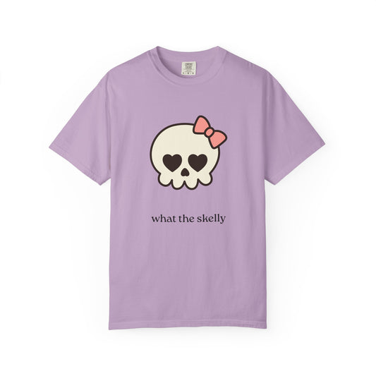 Lavender tee with QT Skelly illustration and “What the Skelly?” message, styled for whimsical spooky season fashion.