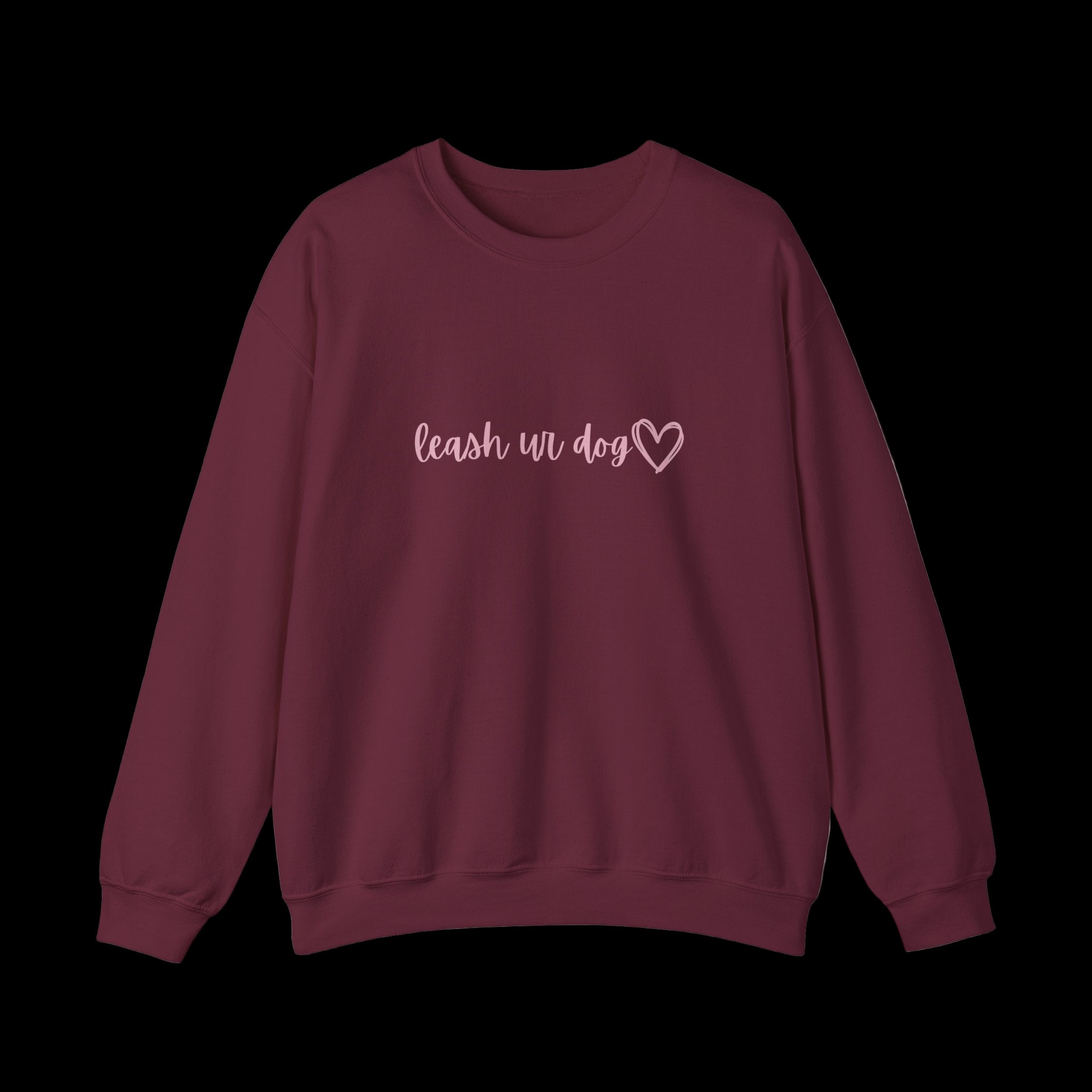 Flat lay of maroon Leash Ur Dog sweatshirt with bold dog-owner reminder graphic.
